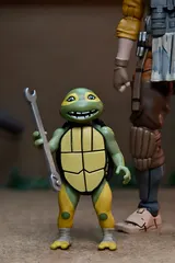 NECA TMNT Ultimate April O'Neil with Baby Yi & Moja – 7" Figure - Thumbnail 4